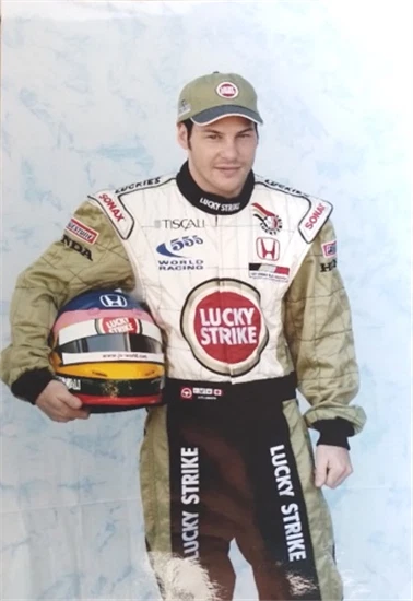 Williams Renault driver Jacques Villeneuve of Canada gives a victory