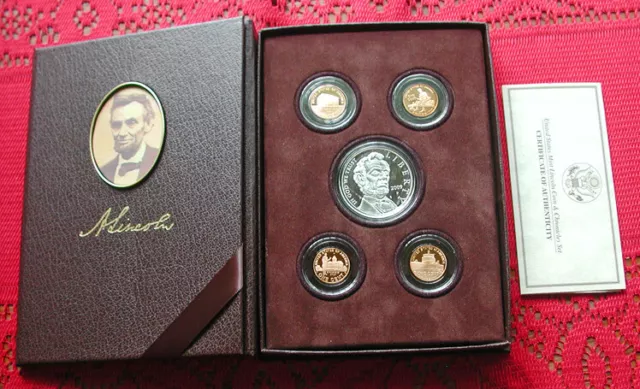 2009 Abraham Lincoln coin & chronicles set-proof silver dollar & copper pennies