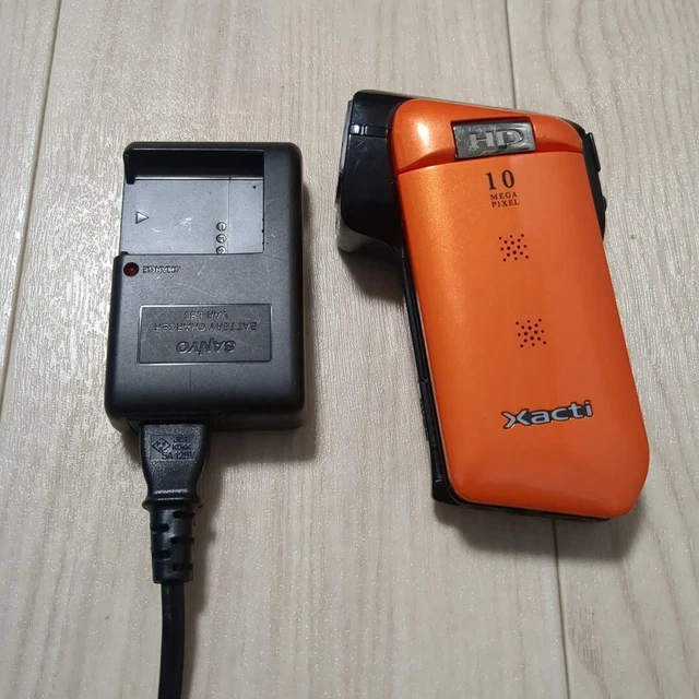 SANYO XACTI DMX-CG11 Orange 10.0 MP Digital Camera Camcorder