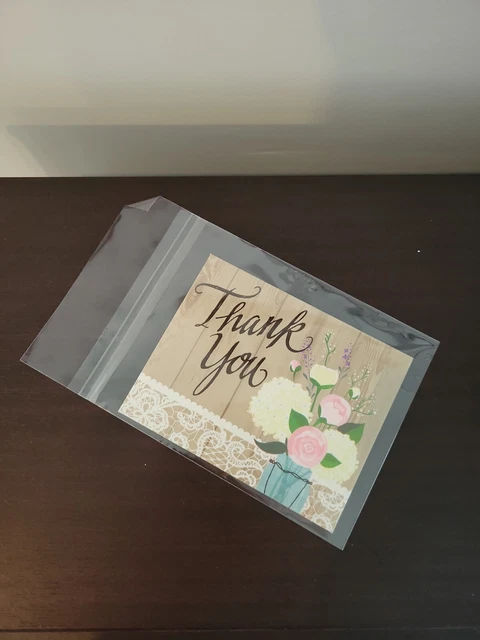 Amazon Basics 100 Pack Clear Greeting Card Sleeves, Transparent Envelopes