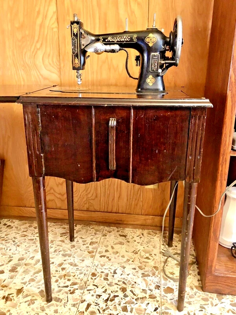 Antique 1927 Majestic Branded White Sewing Machine In Solid Wood Cabinet.