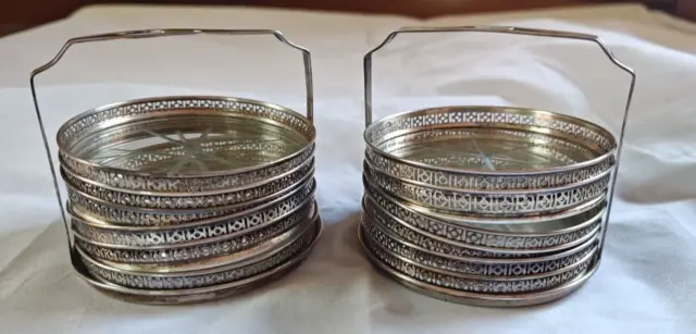 17 Sterling and Cut Glass Coasters with two Sterling caddies, by Webster Co.