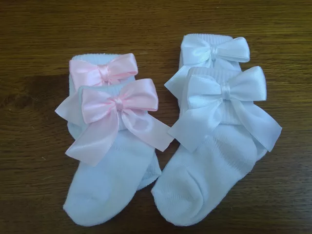 2 pairs of baby girls white  socks with  White/pink bows size  12-24 mths new
