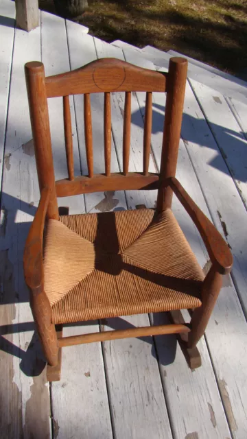 Antique Childs Solid Oak Spindle Back Rocking Chair