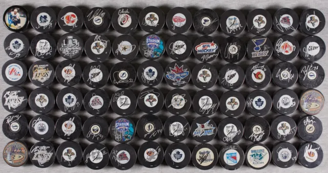 100 NHL PUCKS LOGOS Signed, Plastic Covered, Most Autographs Identified,