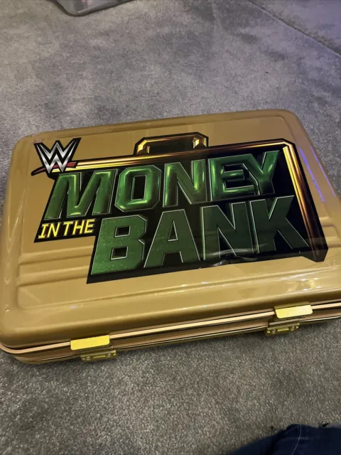 https://www.picclickimg.com/cVYAAOSwUU5lkDdL/wwe-money-in-the-bank-briefcase.webp