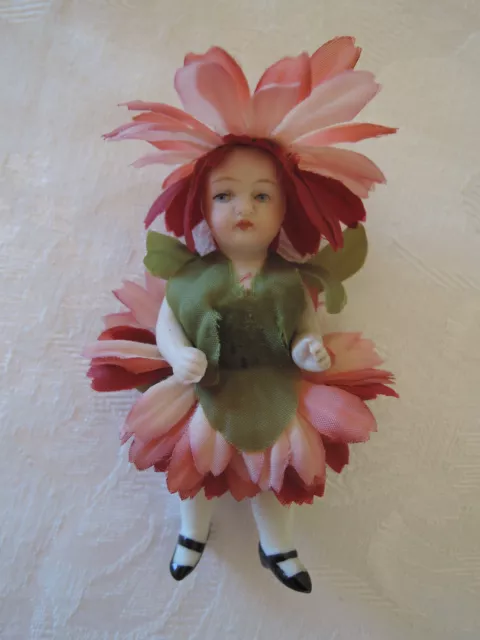 antique miniature German dollhouse bisque doll mignonette, dressed as a daisy