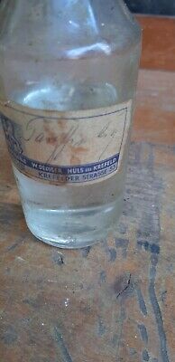 alte Medizin Flasche aus Löwen  Apotheke Hüls b. Krefeld W. Oediger Glas Flacon 3