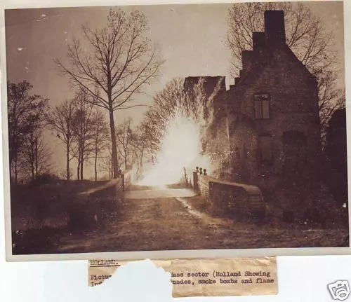 original ww2 photo taken in holland ! smoke bombs & flame over the bridge