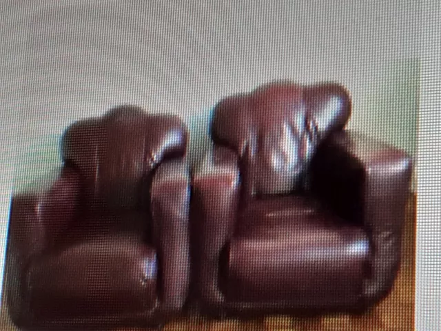 leather armchairs pair