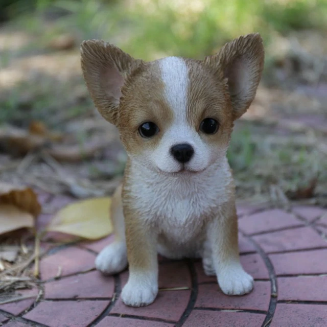 Estatua de jardín de cachorros de chihuahua