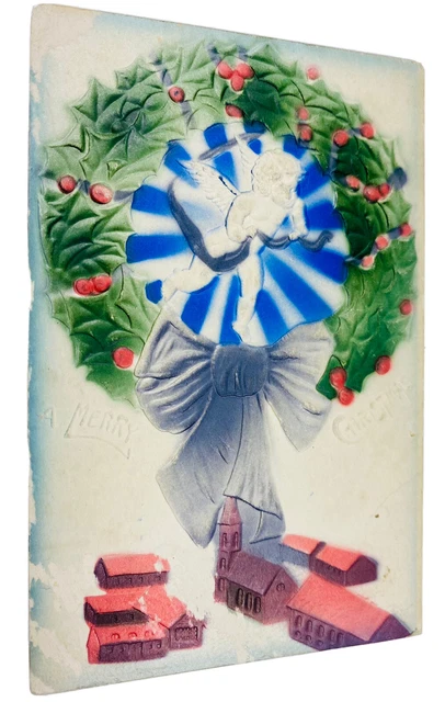 c1910 Frohe Weihnachten geprägt Cherub Airbrushed Kranz Engel Schleife Stechpalme Beere PC