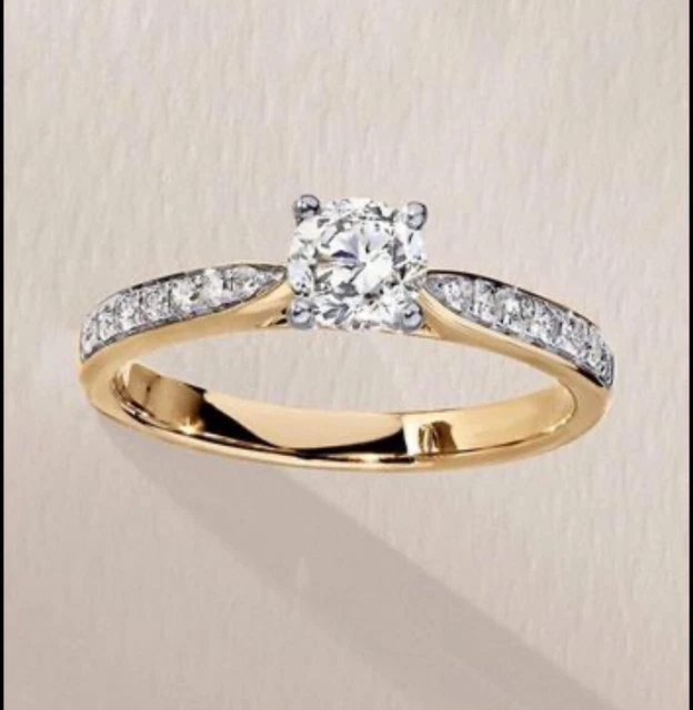 Diamond engagement ring in 9ct yellow gold .70ct (size N)
