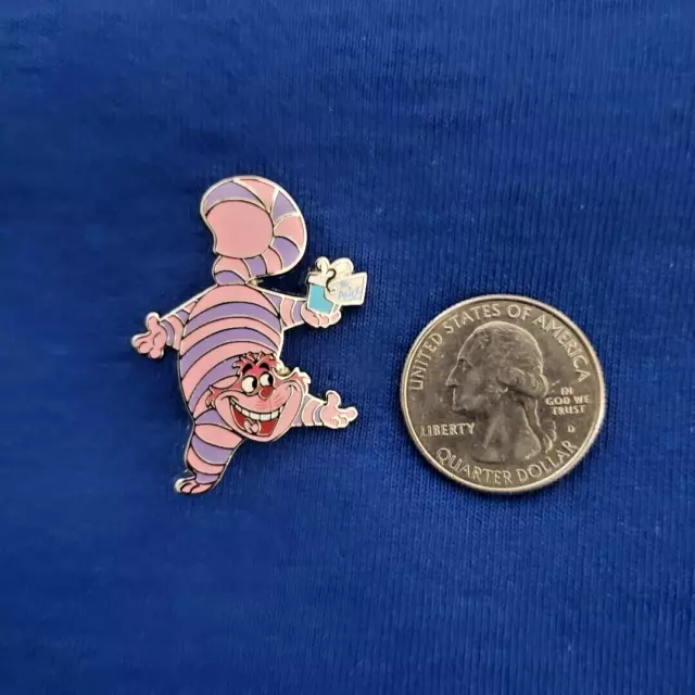 DISNEY Pin Cheshire Cat Holding Gift Present Christmas Alice in Wonderland