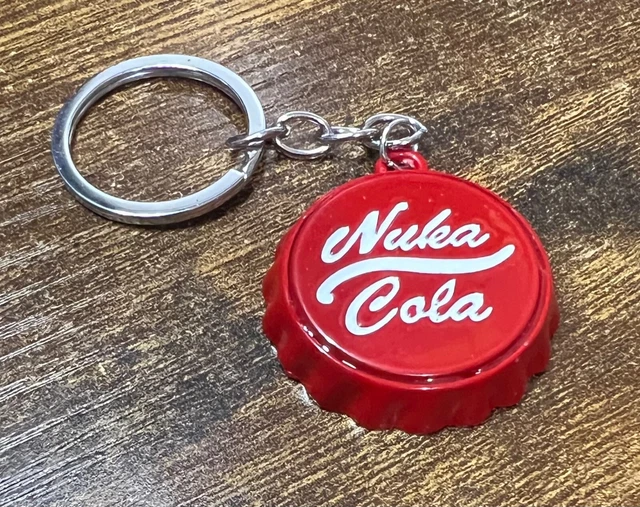 Portachiavi Nuka Cola con apribottiglie esterno | CADERE Portachiavi Nuka Cola con apribottiglie esterno | CADERE
