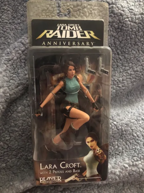 NIP ~ Neca ~Lara Croft Tomb Raider Anniversary ~ 2 pistols ~Sealed