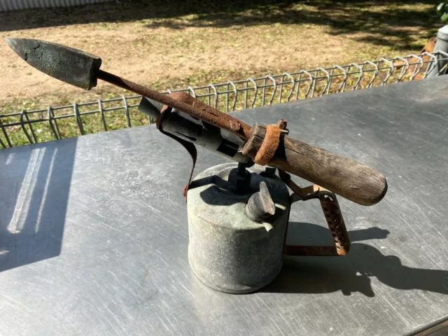 Vintage blow torch and soldering iron.