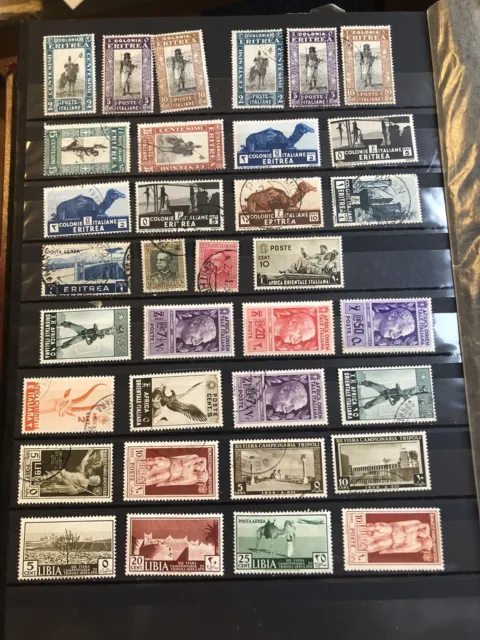 Italien Kolonien Lot an gestempelten , ungebrauchten Briefmarken .