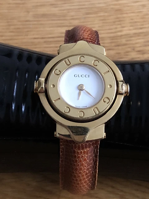 Gucci flip shop watch