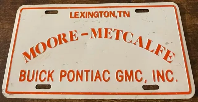 Moore Metcalfe Buick GMC Pontiac Dealership Booster License Plate Lexington TN