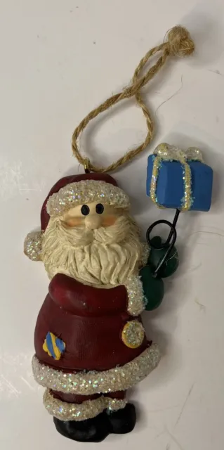 Vintage Santa Claus Resin Christmas Ornament Holding Gift Balloon