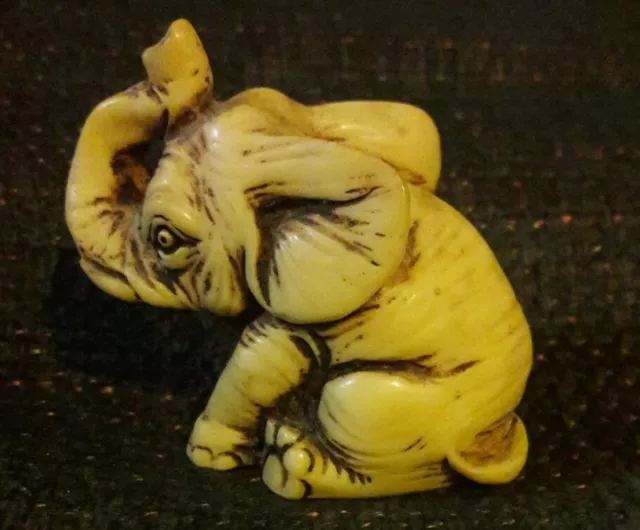 small vintage elephant figure miniature statue hard poly resin ?