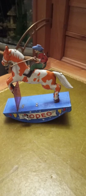 Rare auto mécanique filoguidé en boite Wamoo jouet ancien en tôle