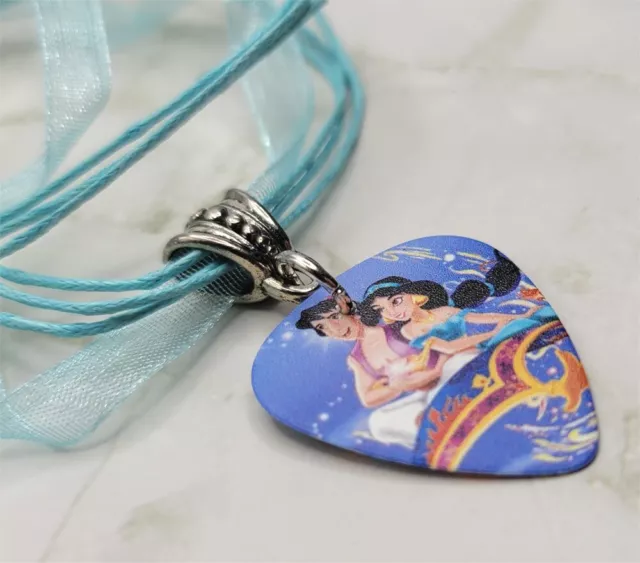 Aladdin and Jasmine Guitar Pick Necklace on Blue Ribbon Cord
