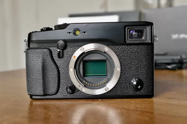 Fujifilm X-Pro 1 camera with 17mm F1.4 lens and accessories