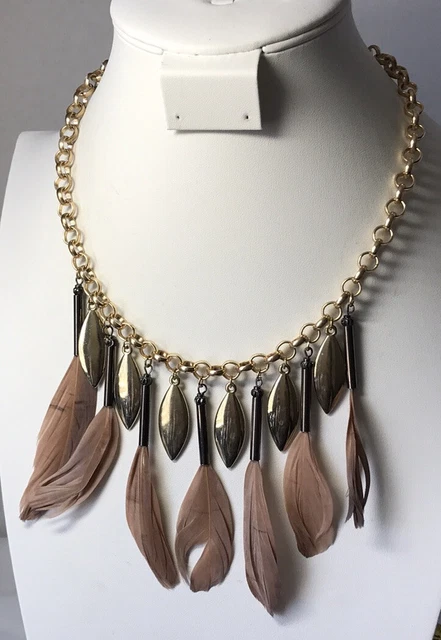 Charming Charlie necklace with hanging tan / brown feathers, Gold Tone
