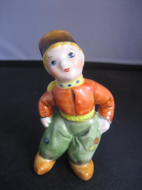 Vintage Japanese hand painted porcelain boy figurine