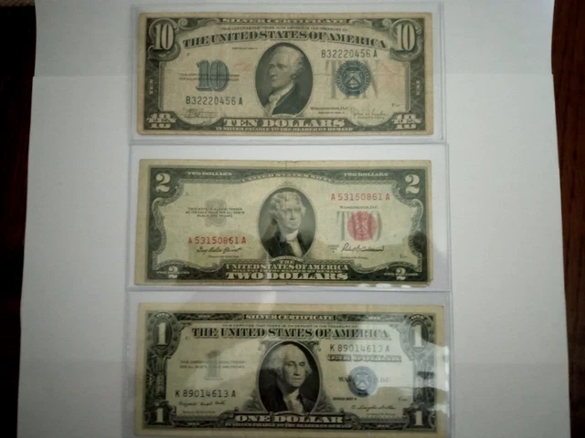 1934c $10 dollar silver certificate blue seal also $2 Dollar 1953A red seal.