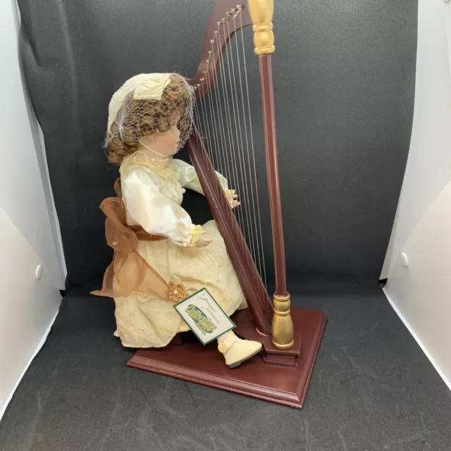Musical Mallory with Harp Porcelain Doll By Heritage Signature Collection