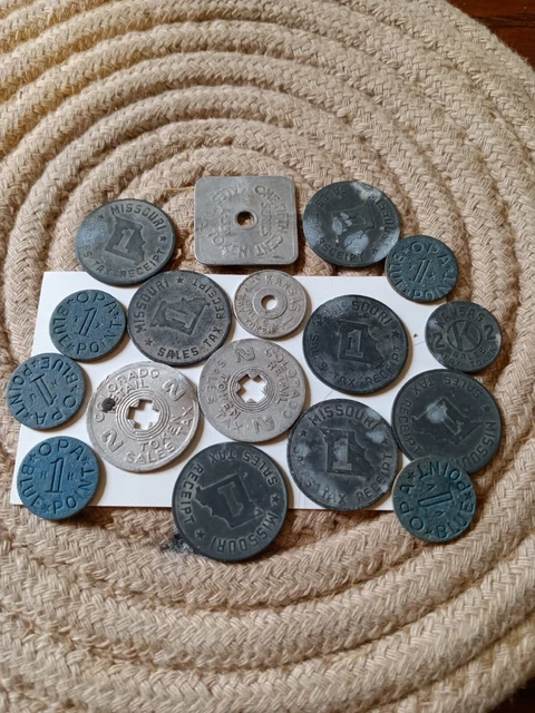 Seventeen SALES TAX RECEIPT TOKENS!