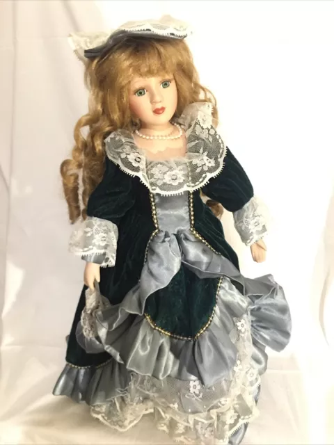 porcelain doll 17” On Metal Stand Beautiful Doll