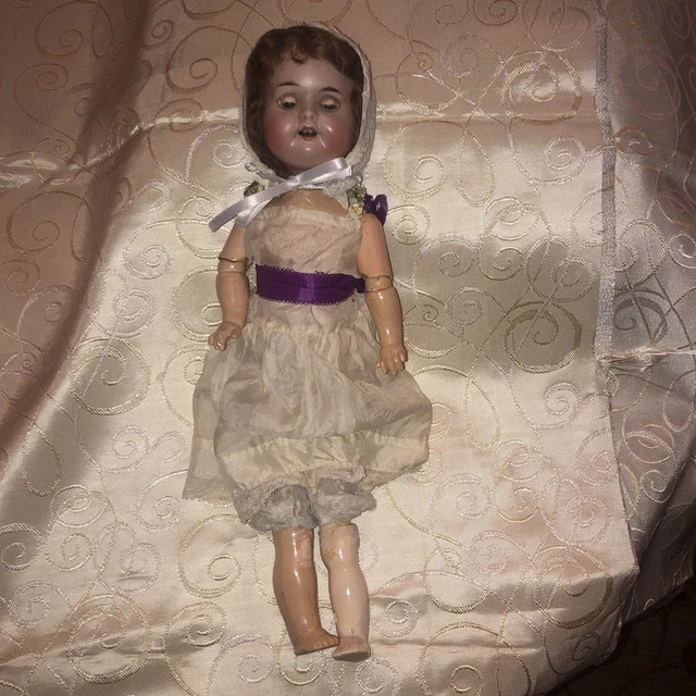 Antique german bisque headed doll.