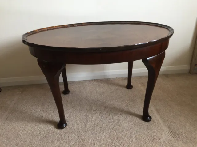 Antique burr walnut oval coffee table