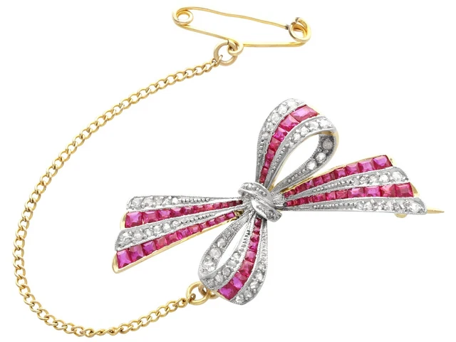 Antique 0.78Ct Ruby and 0.40Ct Diamond 18k Yellow Gold Bow Brooch Circa 1910
