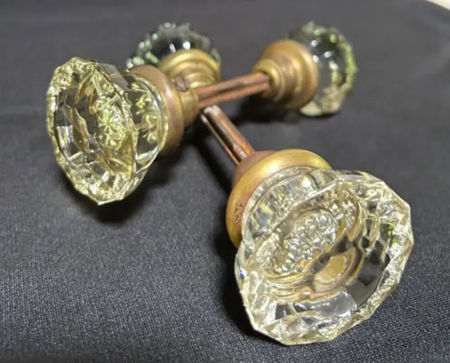 Antique 2 pair glass 12 point door knobs with brass shank