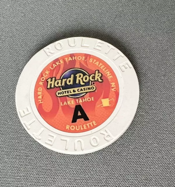 (1) Obsolete White Roulette Casino Chip Hard Rock Lake Tahoe, Nv.