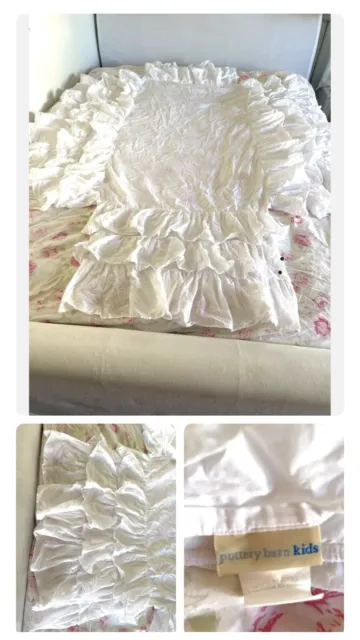 White.  Pottery Barn Kids Triple Tiered Ruffle Crib Skirt Dust Ruffle