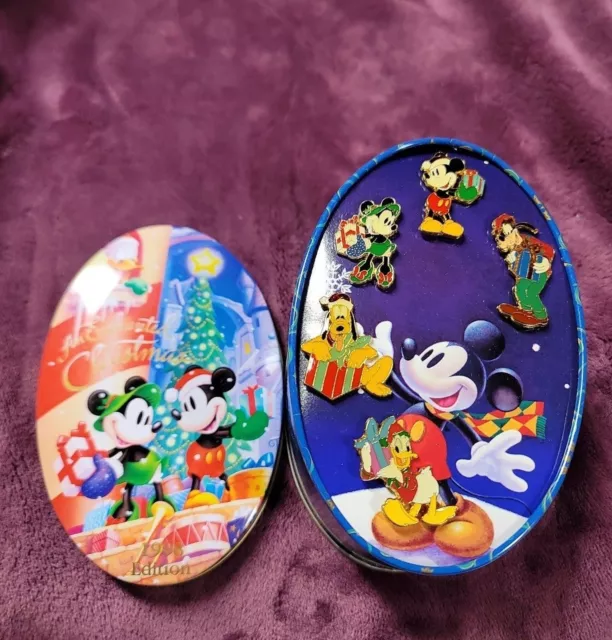 Disneys An Enchanted Christmas 1998 edition 5 pin set .