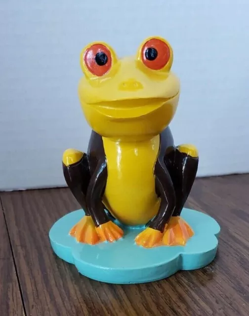 Painted Neon Yellow 5 Inch Ceramic Frog With Red Eyes on Blue Lily Pad Figurine