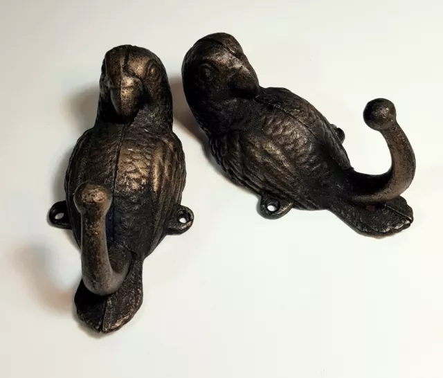 Pair of heavy bronzed cast iron bird coat hooks. Rosella. Australian birds