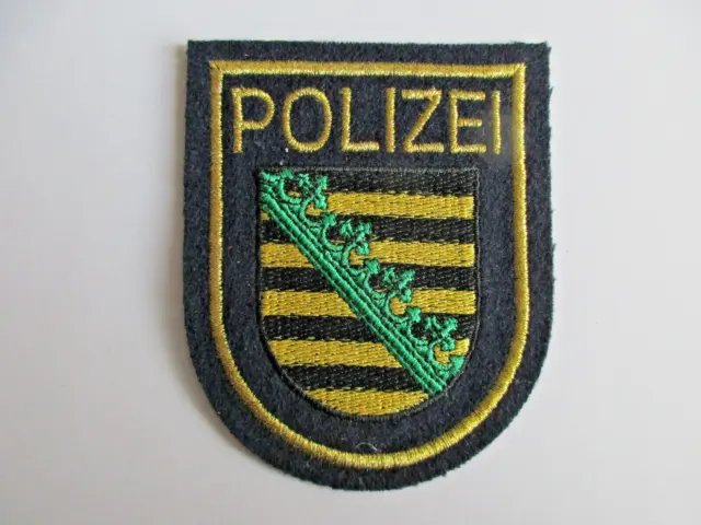 1 blaues Original Polizeiabzeichen. Sachsen, Lurexstickung/Filz, Uniform, Patch