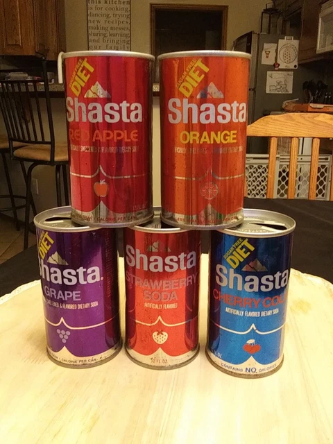 5) Vintage straight steel shasta soda cans