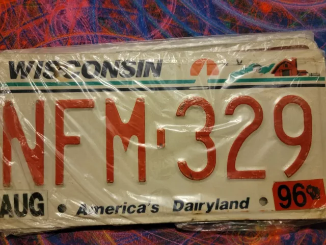 Wisconsin License plate- Dairy Land, NFM 329, Exp 1996