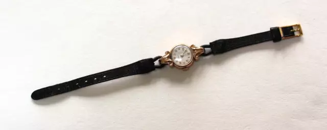 Montre de dame en Or et Argent bracelet cuir - Poids 9,28 g.