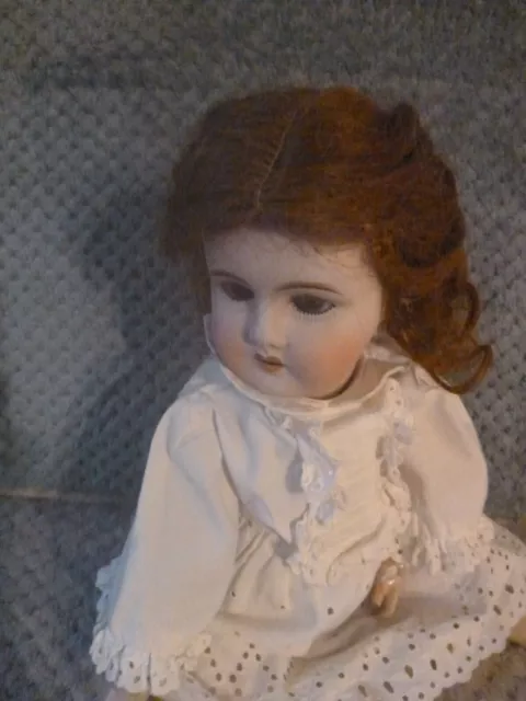 poupée Ancienne tête LEON PRIEUR Limoges parfait état
