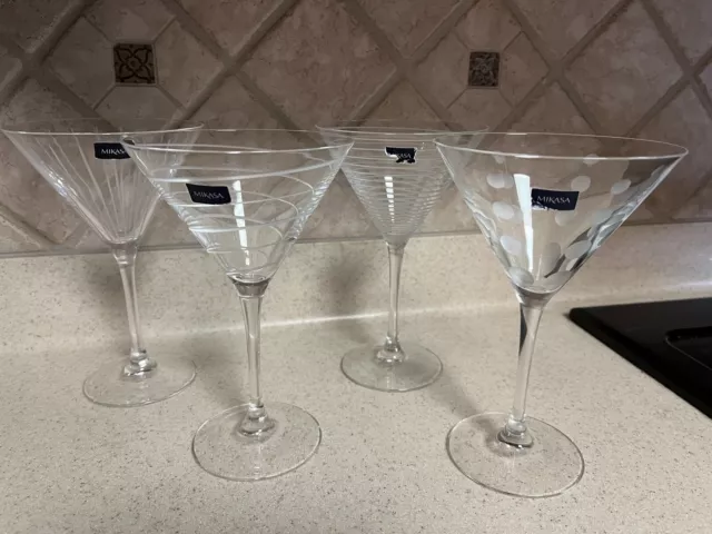 https://www.picclickimg.com/d6cAAOSwNPti-EJE/Set-4-Mikasa-CHEERS-10-Ounce-Martini-Glasses-Four.webp